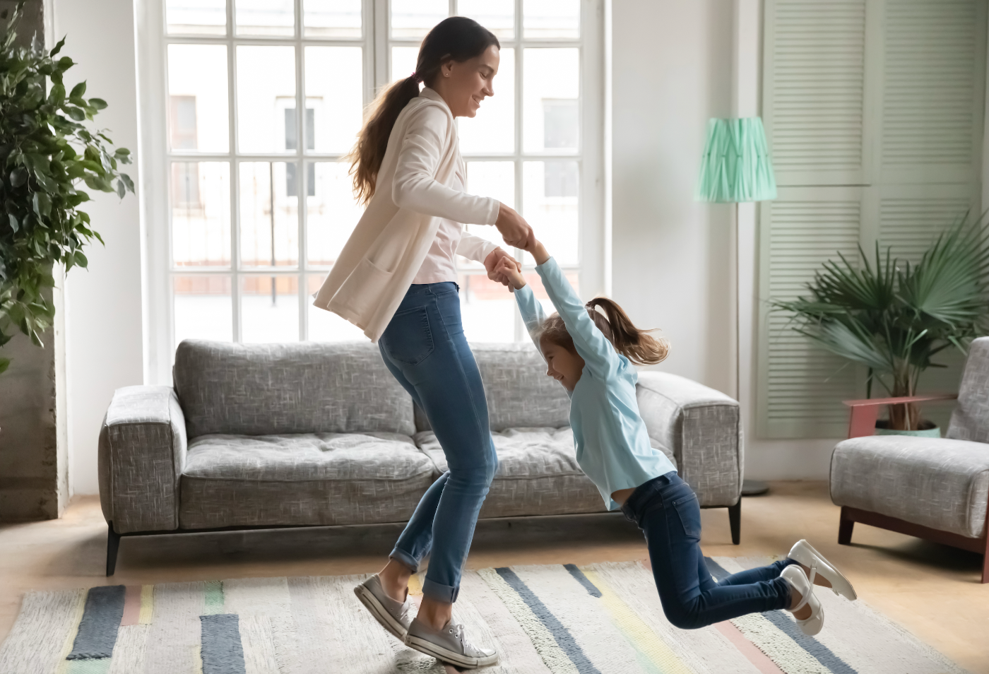 woman playing with her child.. increase energy with NAD+